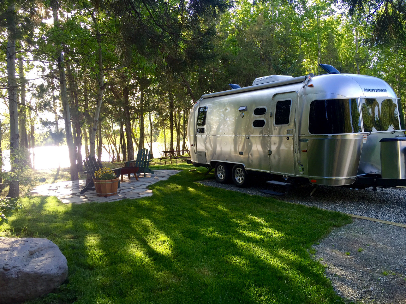 Our Deluxe Patio Sites are right next to the river.
