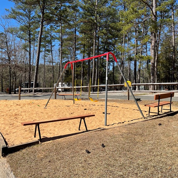Swings, sand box and sand toys