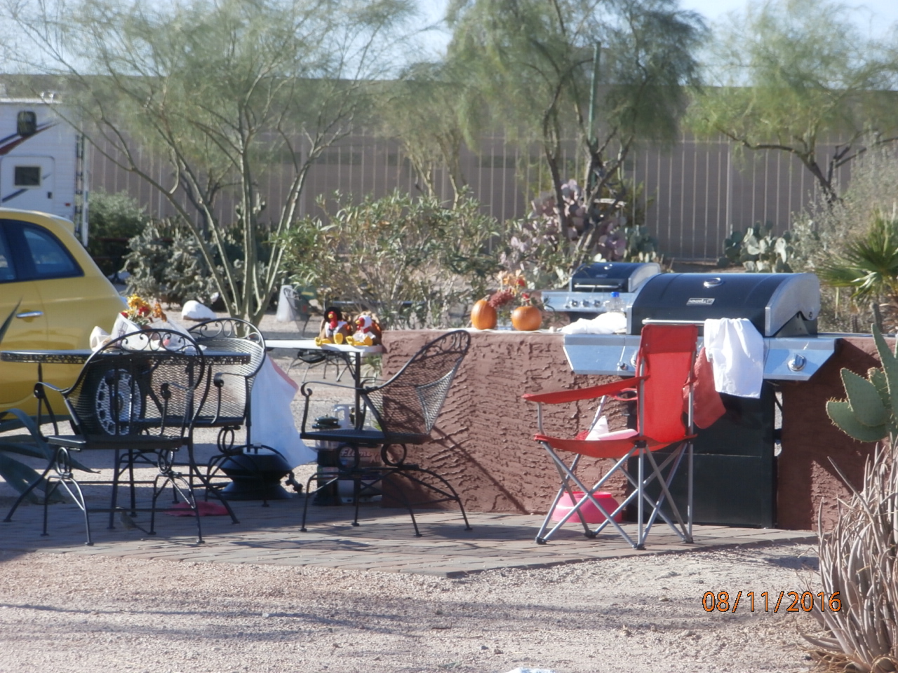 Pull Thru, 50/30 Amps, Full Hookups, Deluxe Patio Site Deluxe patio beautifully landscaped, specialty patio furniture, gas barbecue and sink. Best view of the Superstitions. Limited number available.