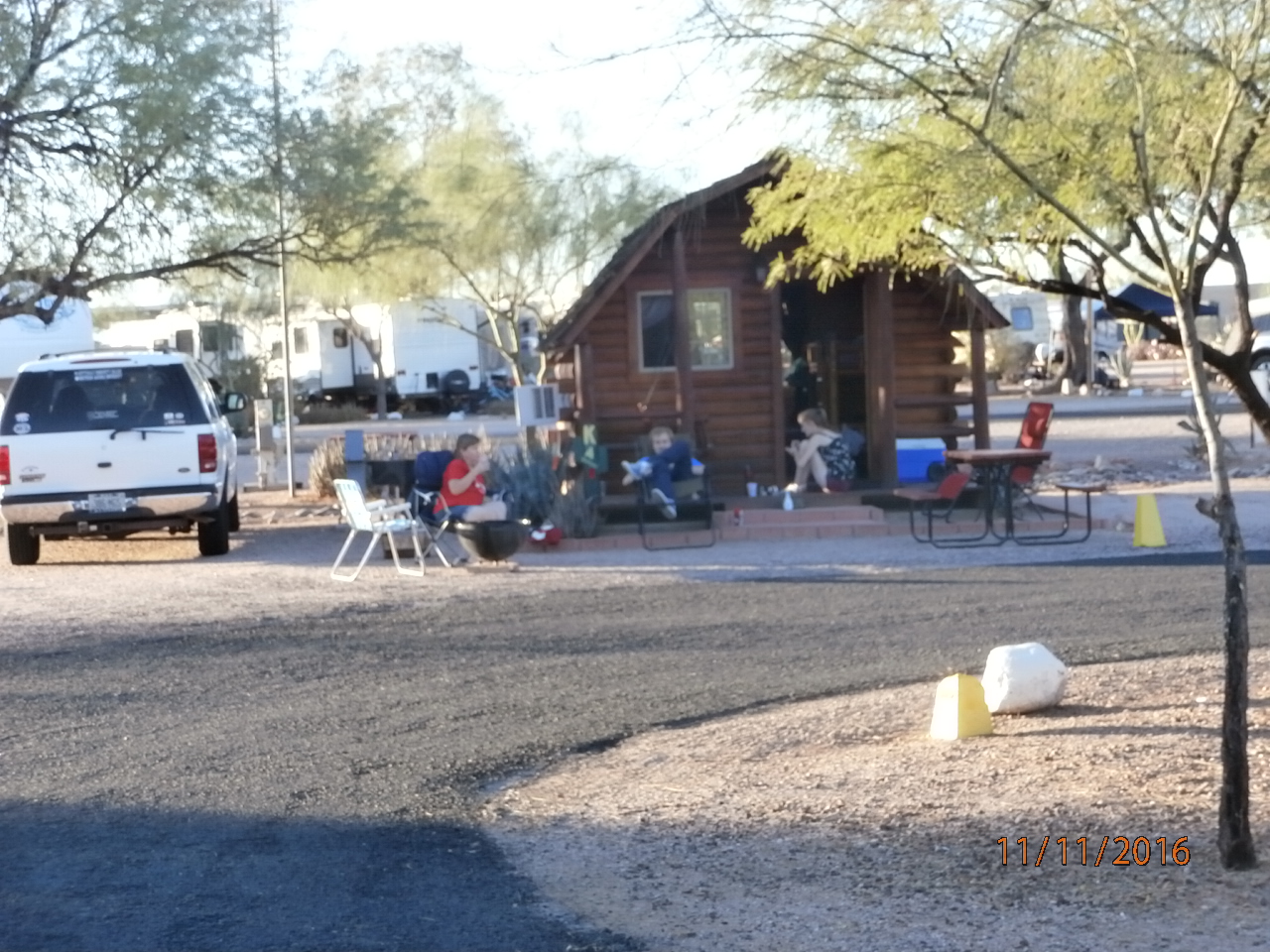 1 Room Camping Cabin (w/o Bathroom) These log cabins sleep 4 people in a double bed and two bunk beds. Sit in the front porch swing and enjoy the view of the Superstition Mountains or cook dinner on the outdoor grill. No pets!