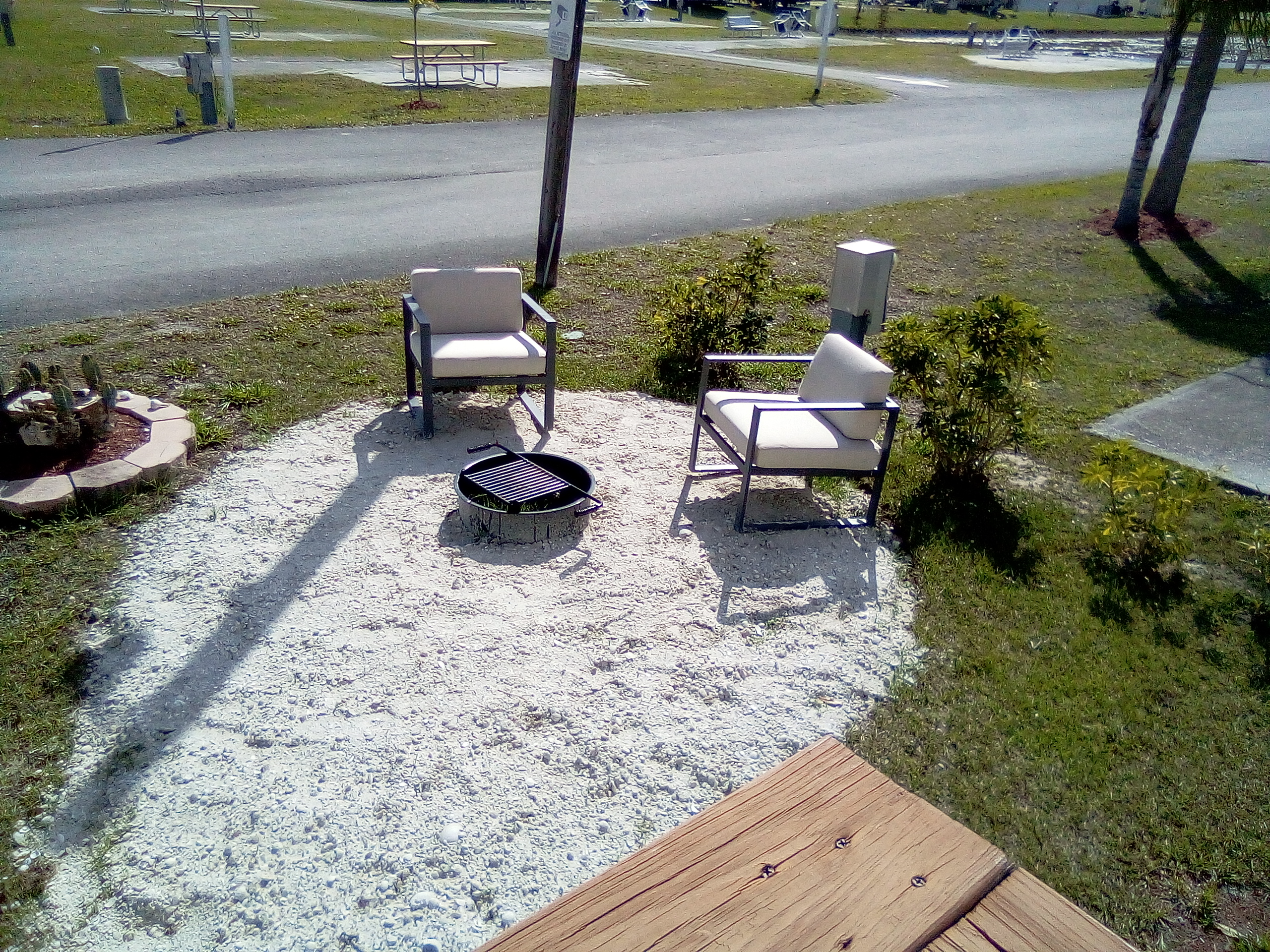 Deluxe Cabin  Patio/Fire Ring seating #2