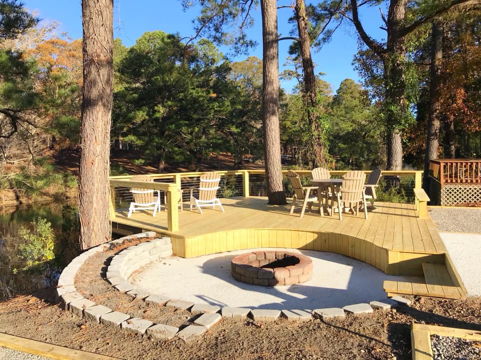 Deluxe Full Hook-Up Patio Site Back In Water Front  300's (Pink) Fire Pit