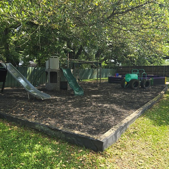 Beautifully shaded playground under a Live Oak tree canopy!