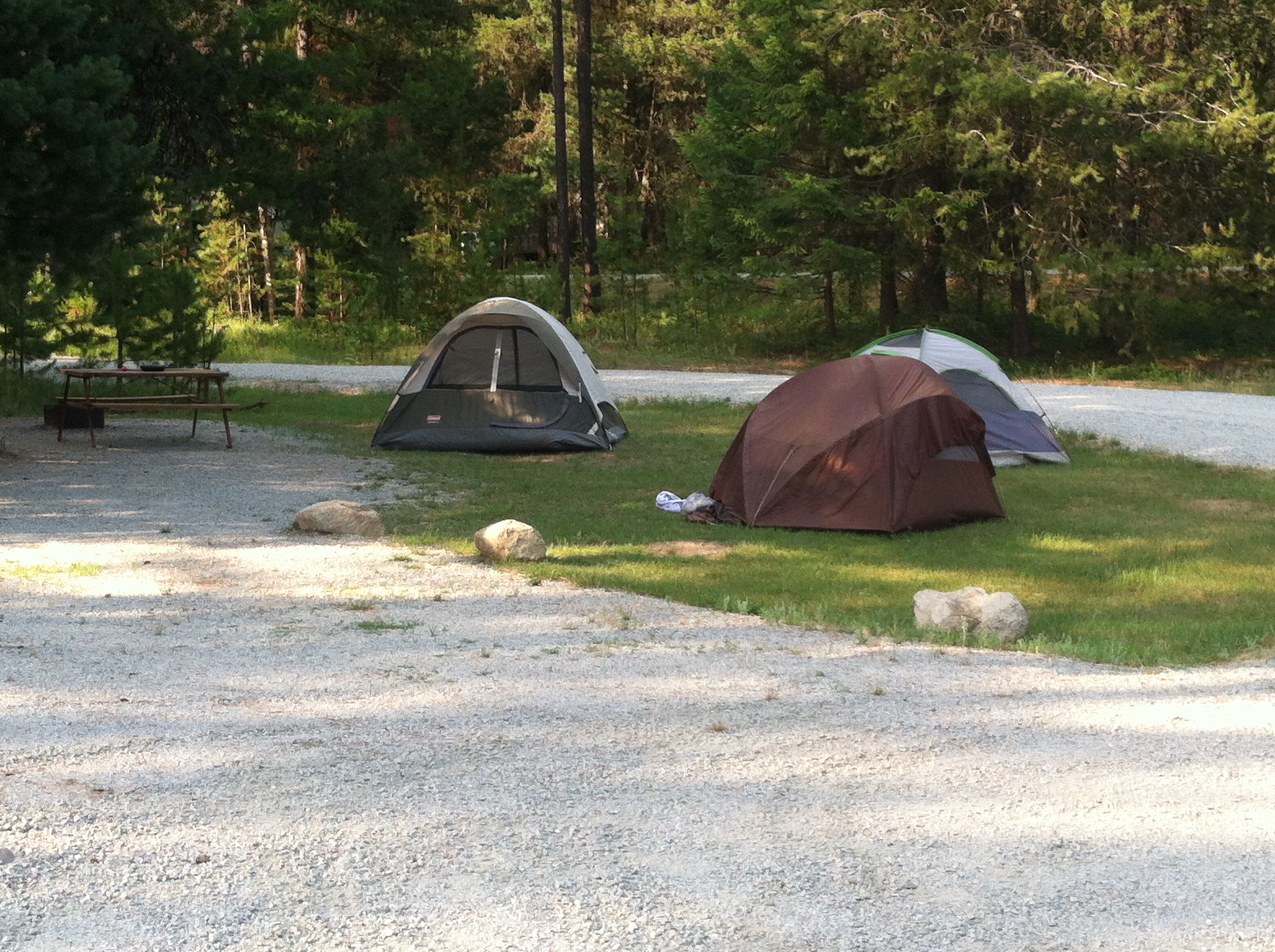Tent site w/ power and water. No tent pad