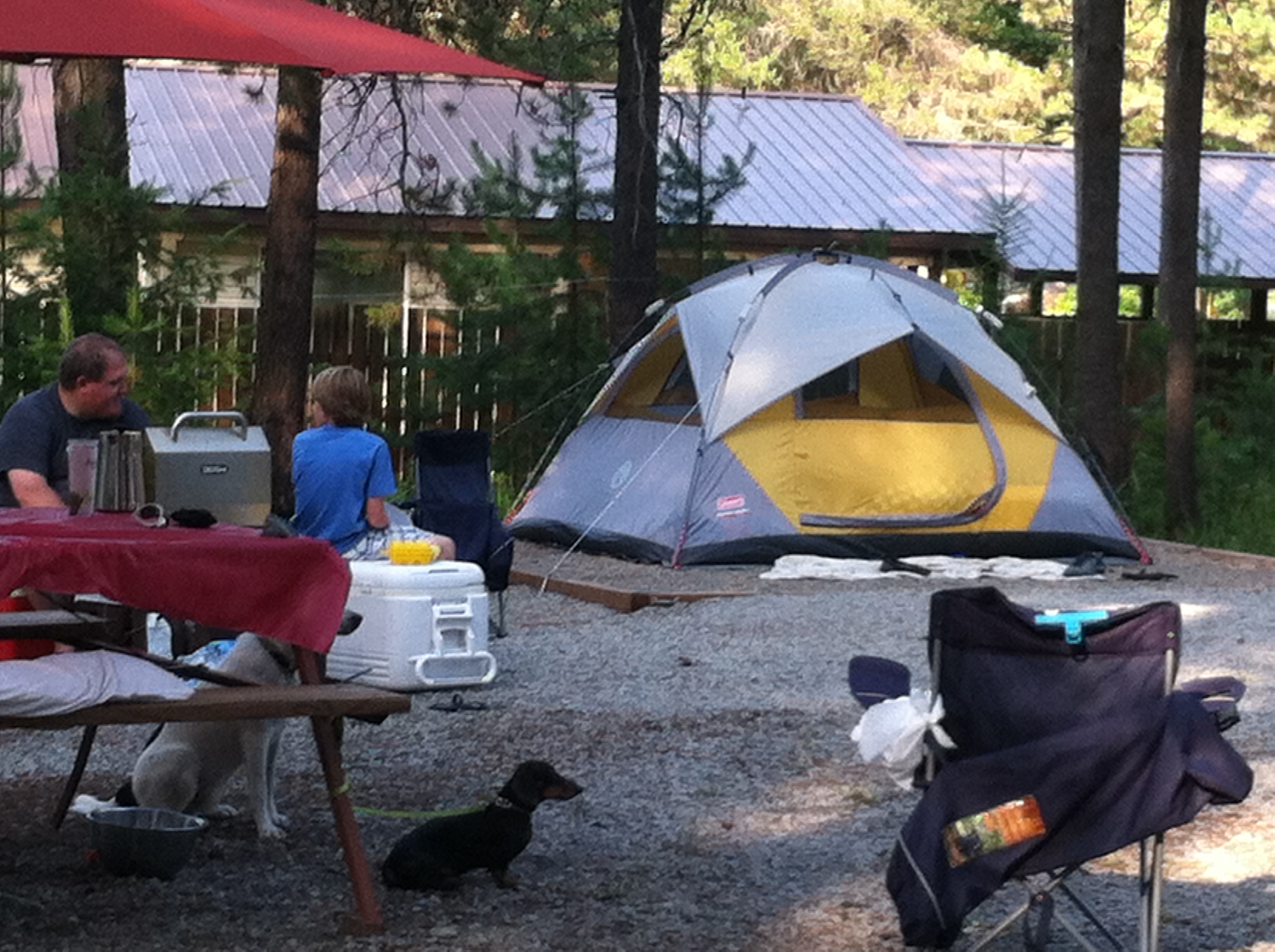 Tent Site with power and water w/ soft pad.