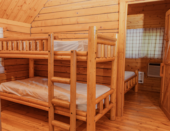 Relax in one of our cozy cabins, where comfort and convenience come together to create the perfect home base for exploring the area.