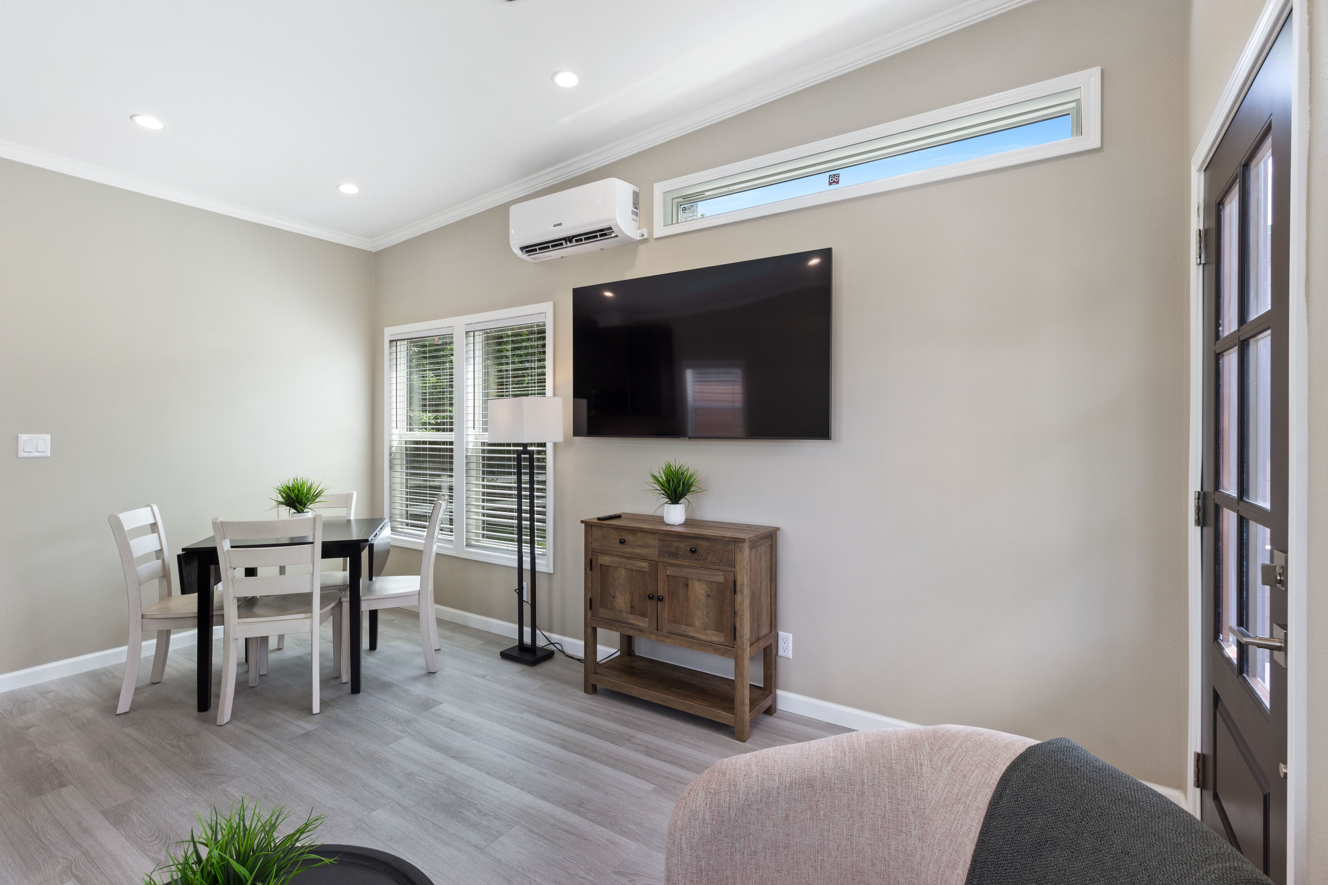 Living room TV and dining area