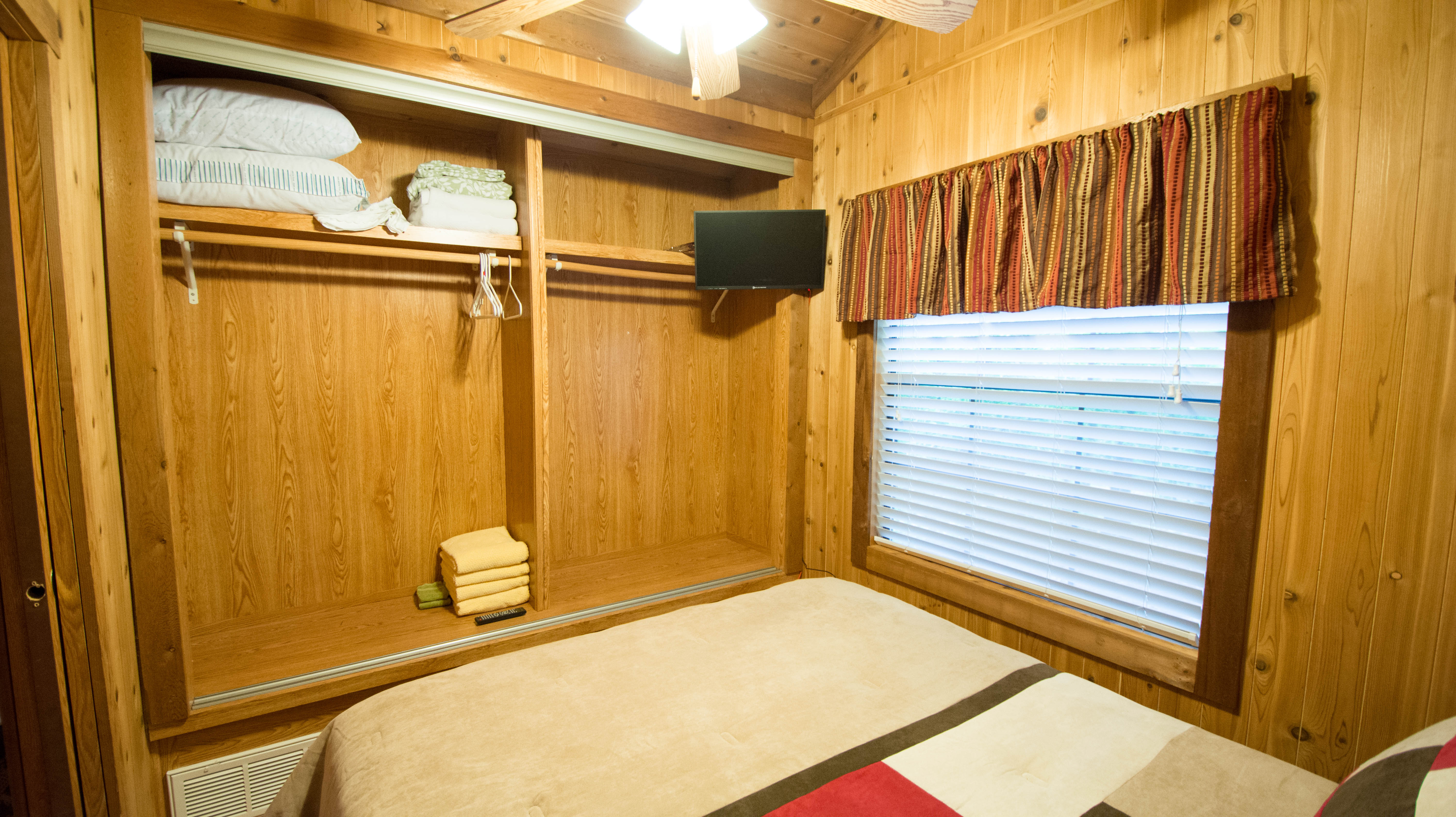 Storage Area & TV in Bedroom