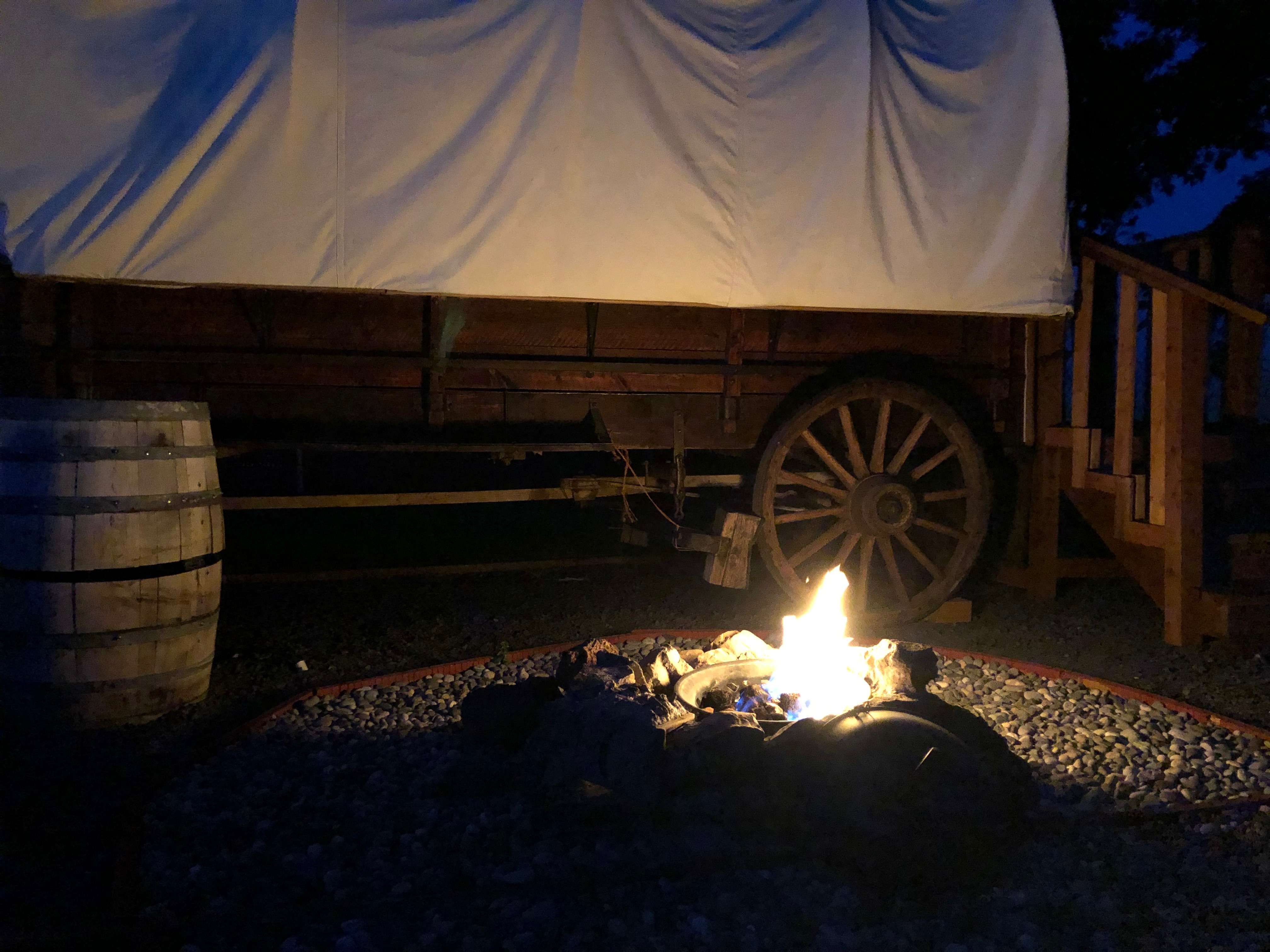 Covered Wagon campsite at night