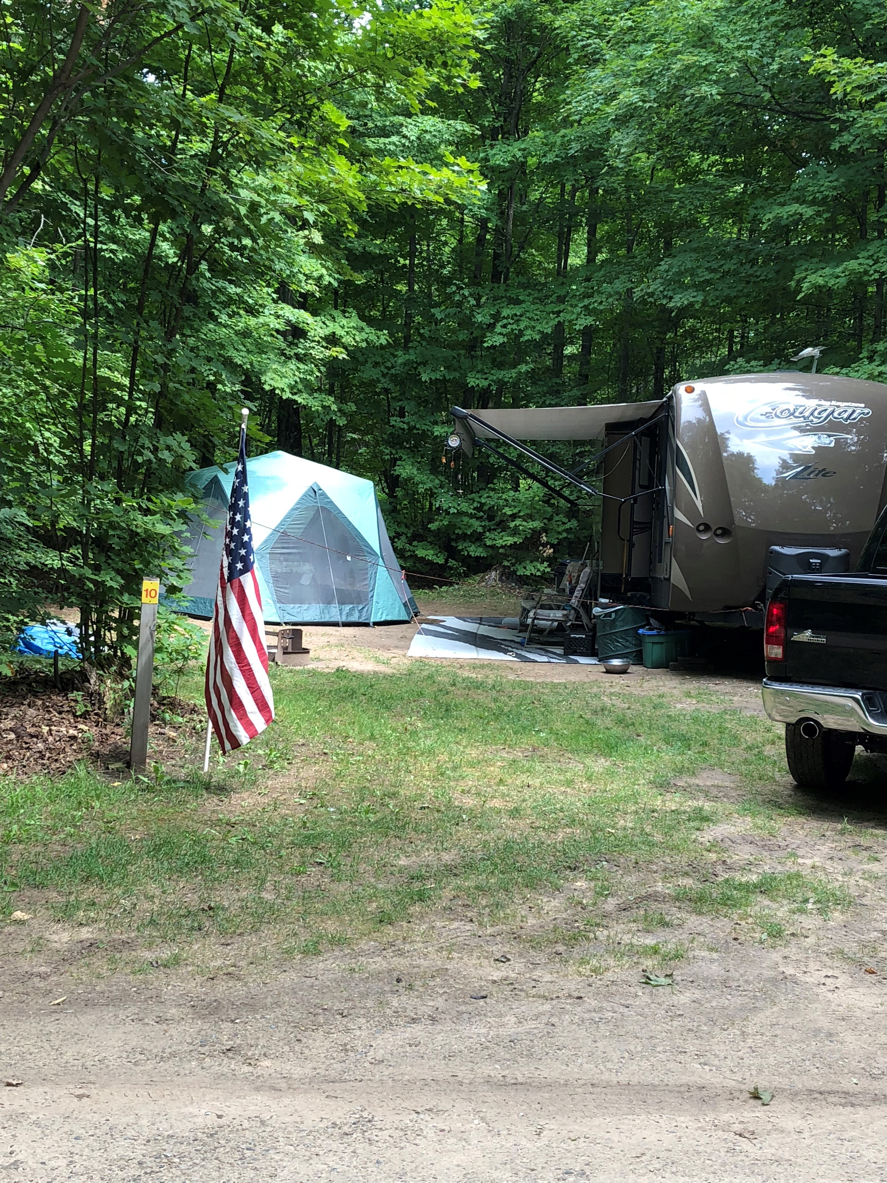 This is a site in one of our favored spots backing up to the woods, 50 amp service with water and electric.