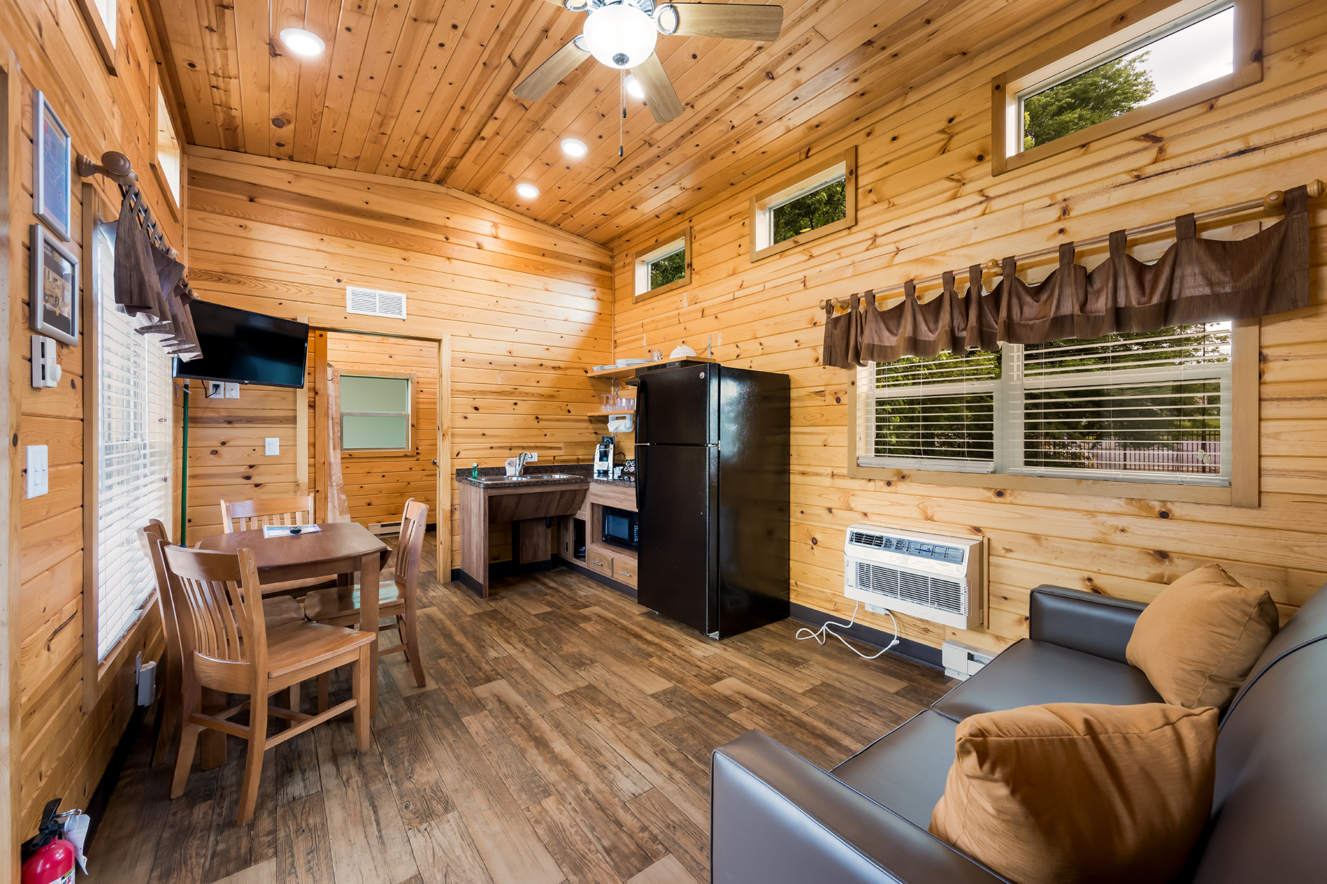 DC301_Deluxe Cabin, 1RM with KOA Patio®, Accessible (Full Bath with Shower) – Sleeps 4