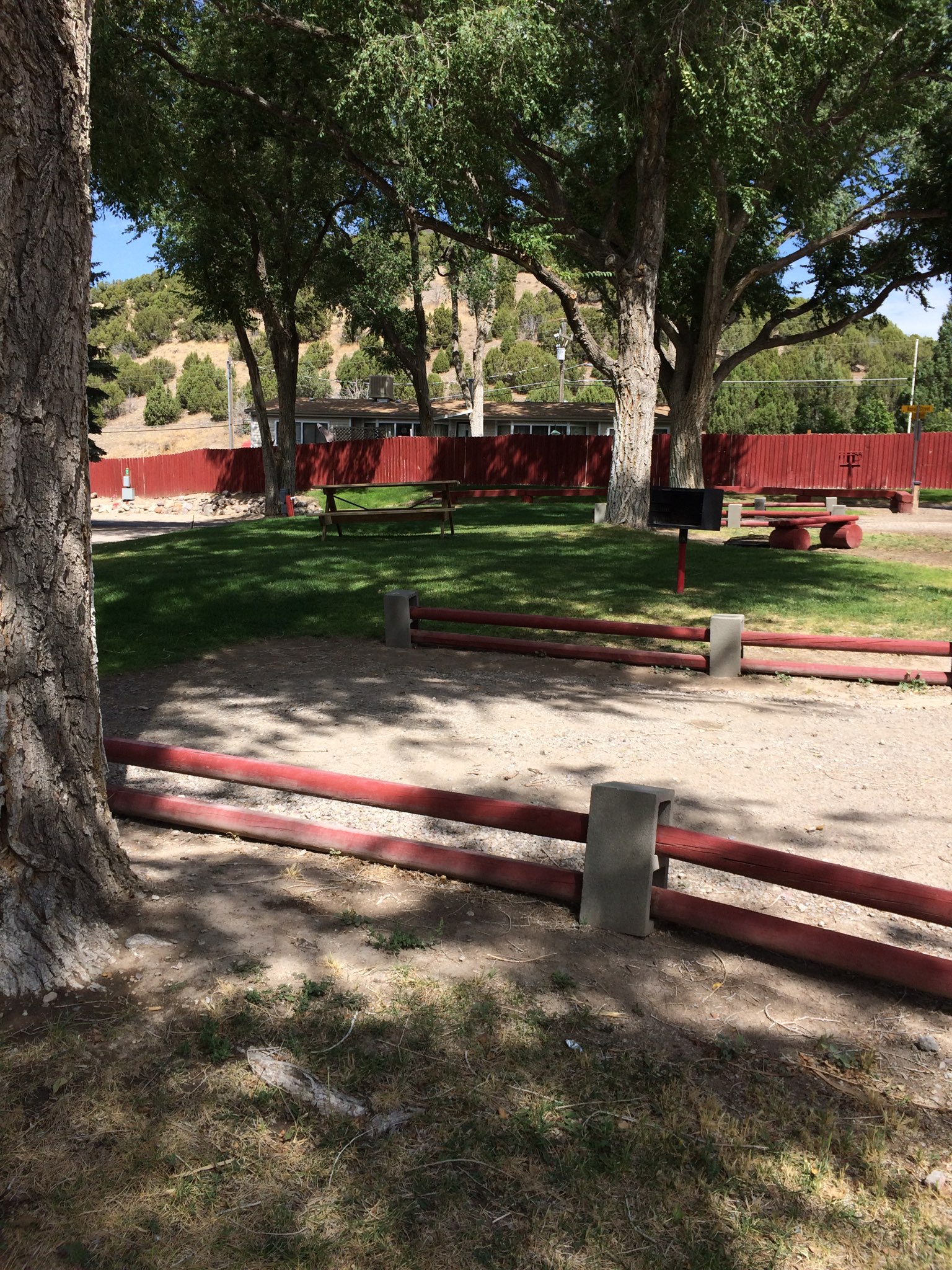 center tent site with no hooks, has grill and water, fire pits