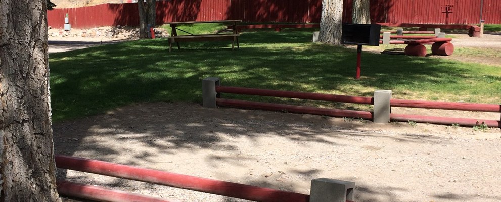 center tent site with no hooks, has grill and water, fire pits