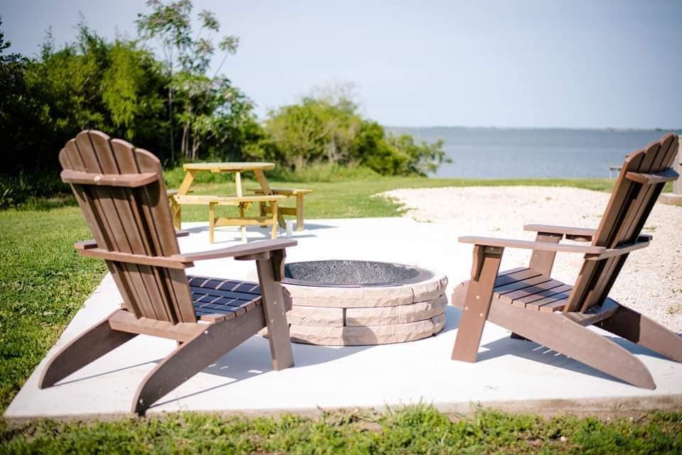 Waterfront Patio Site, with nice seating and a fire pit!