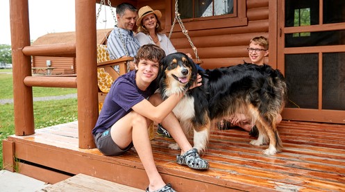 Camping Cabin Family with Dog