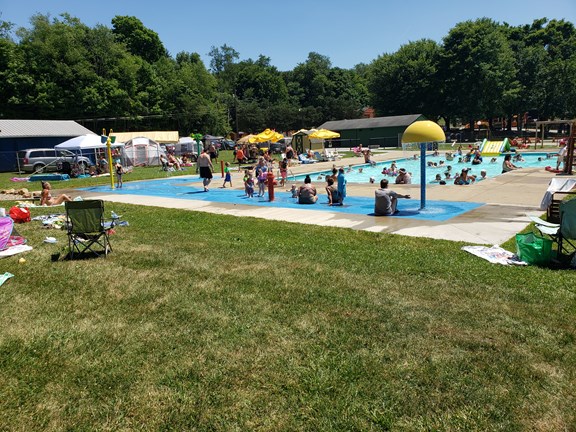 Solar Heat Covered Olympic Size Swimming Pool and Splash Pad