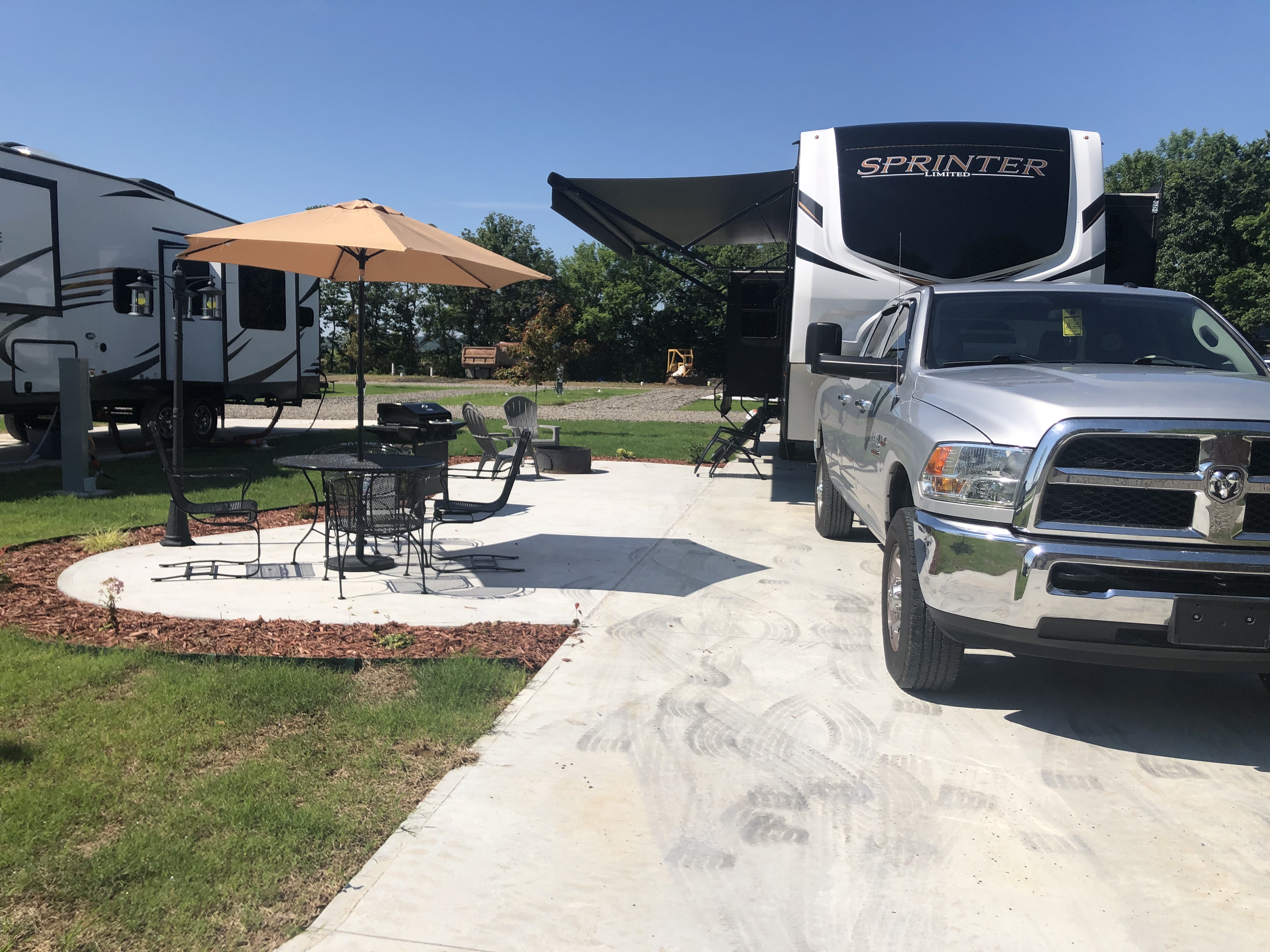 Deluxe patio with your own gas grill and 90' concrete pad. Plenty of room for everything!