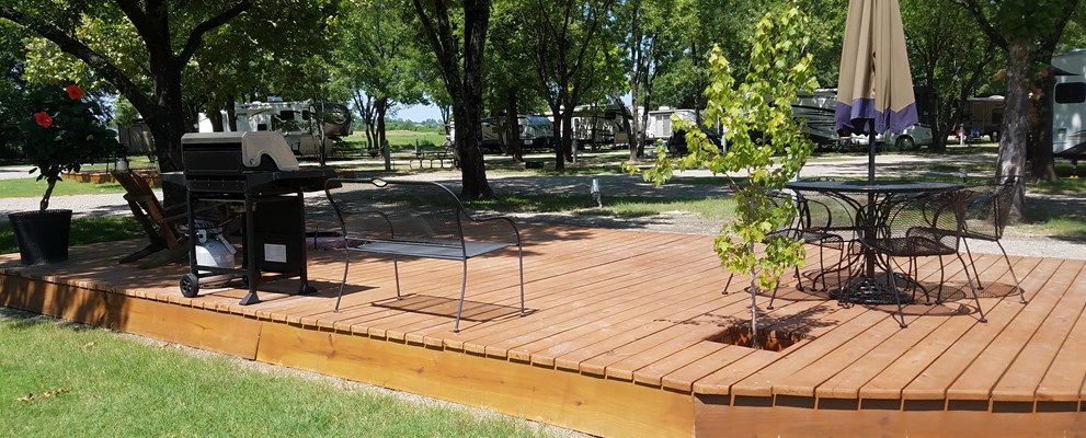 Your private deck comes with a gas grill, table and chairs with an umbrella, adirondack chair and rocker, and built-in fire pit. Just bring the friends, family, and marshmallows!