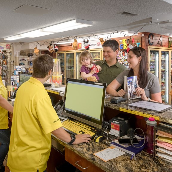 Friendly Staff Helping Happy Campers