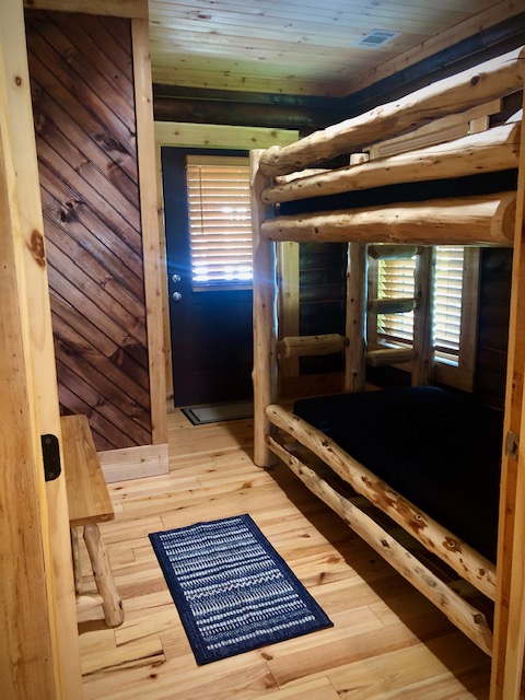 Teresa's Cabin second bedroom with one set of bunk beds.