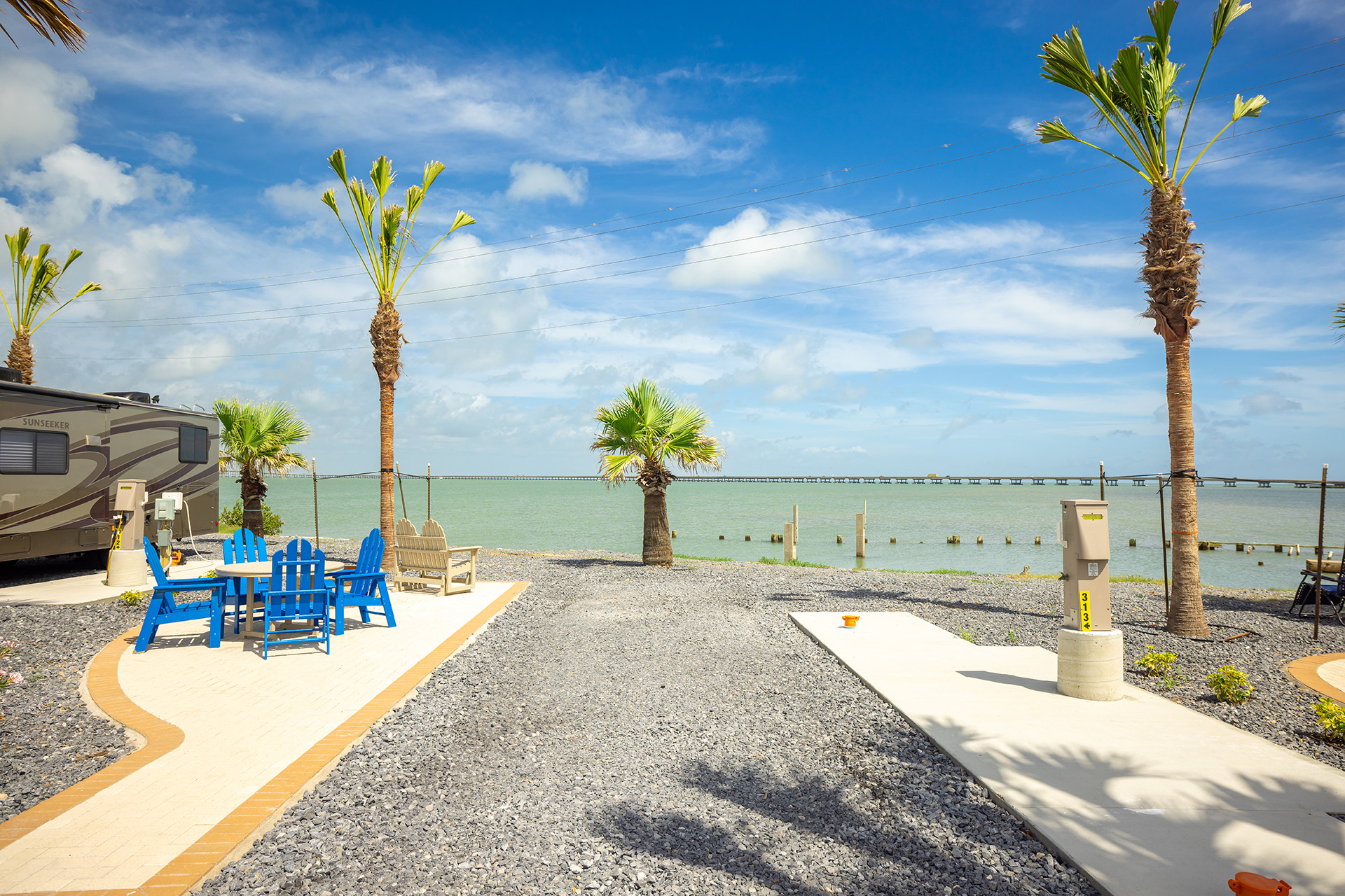 RV 313, Back-In 50/30 AMPS FHU KOA Patio®, Waterfront