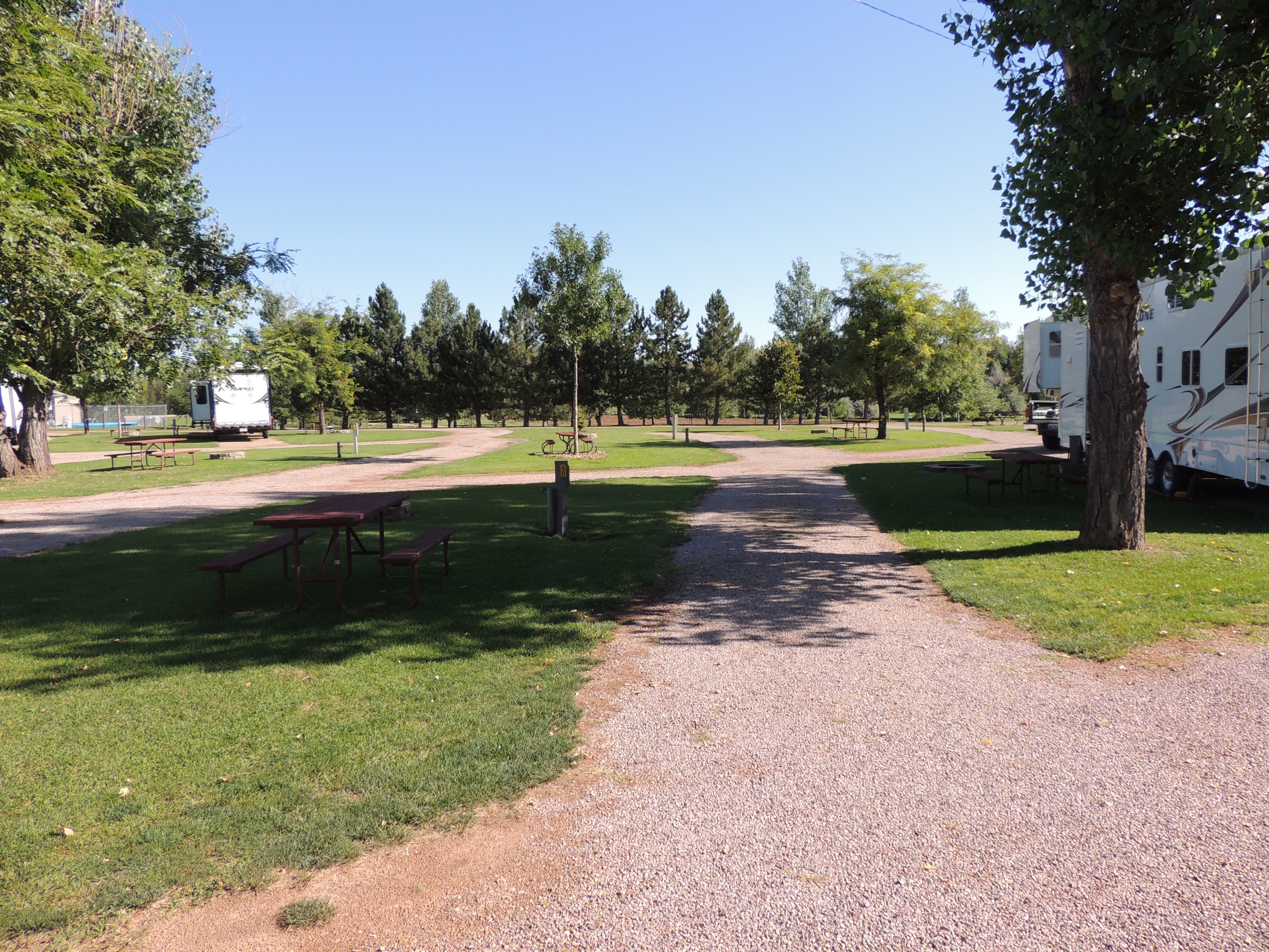 All of our sites are level and most have grass and shade.