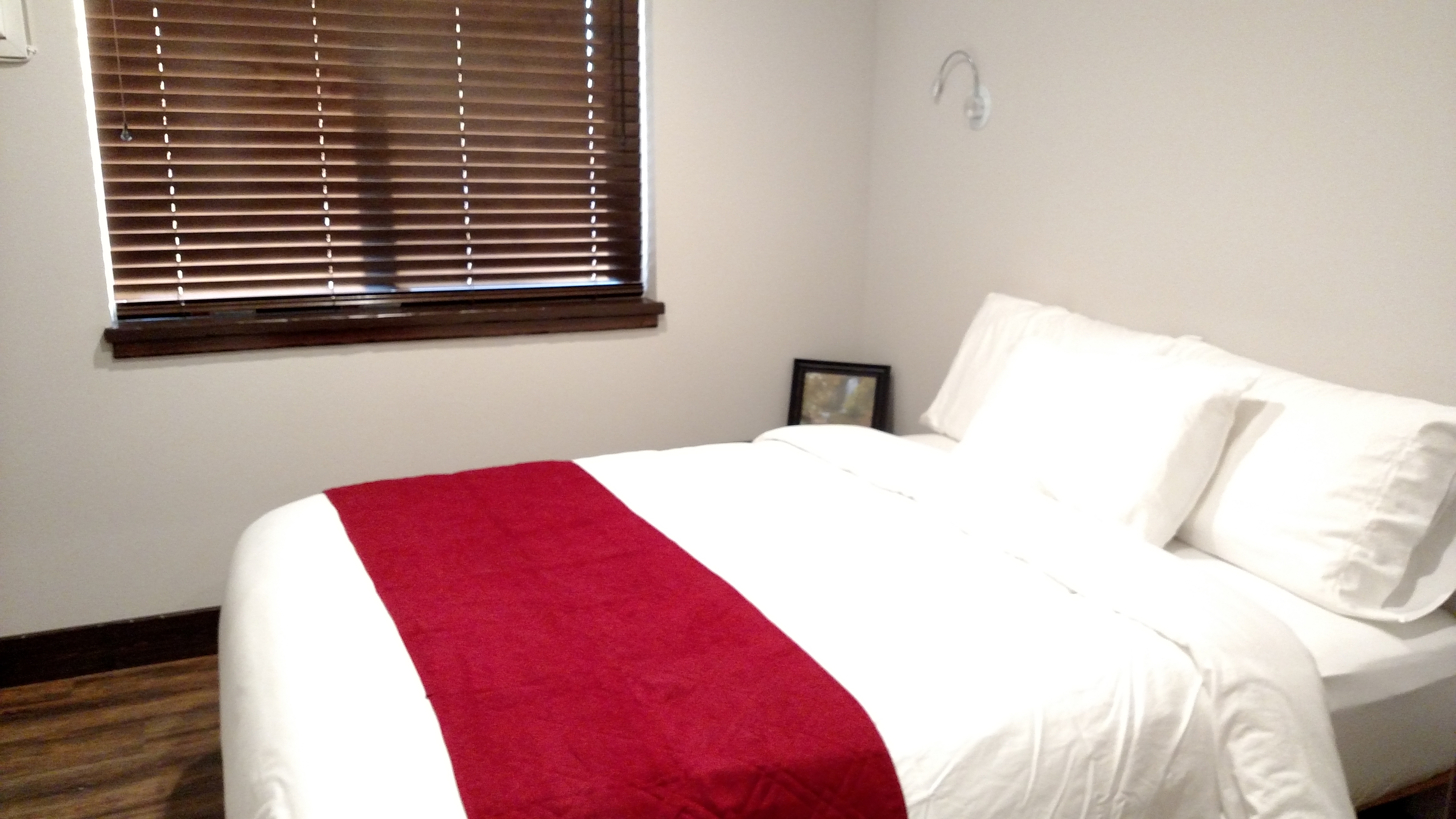 Queen bed in a two bedroom deluxe cabin