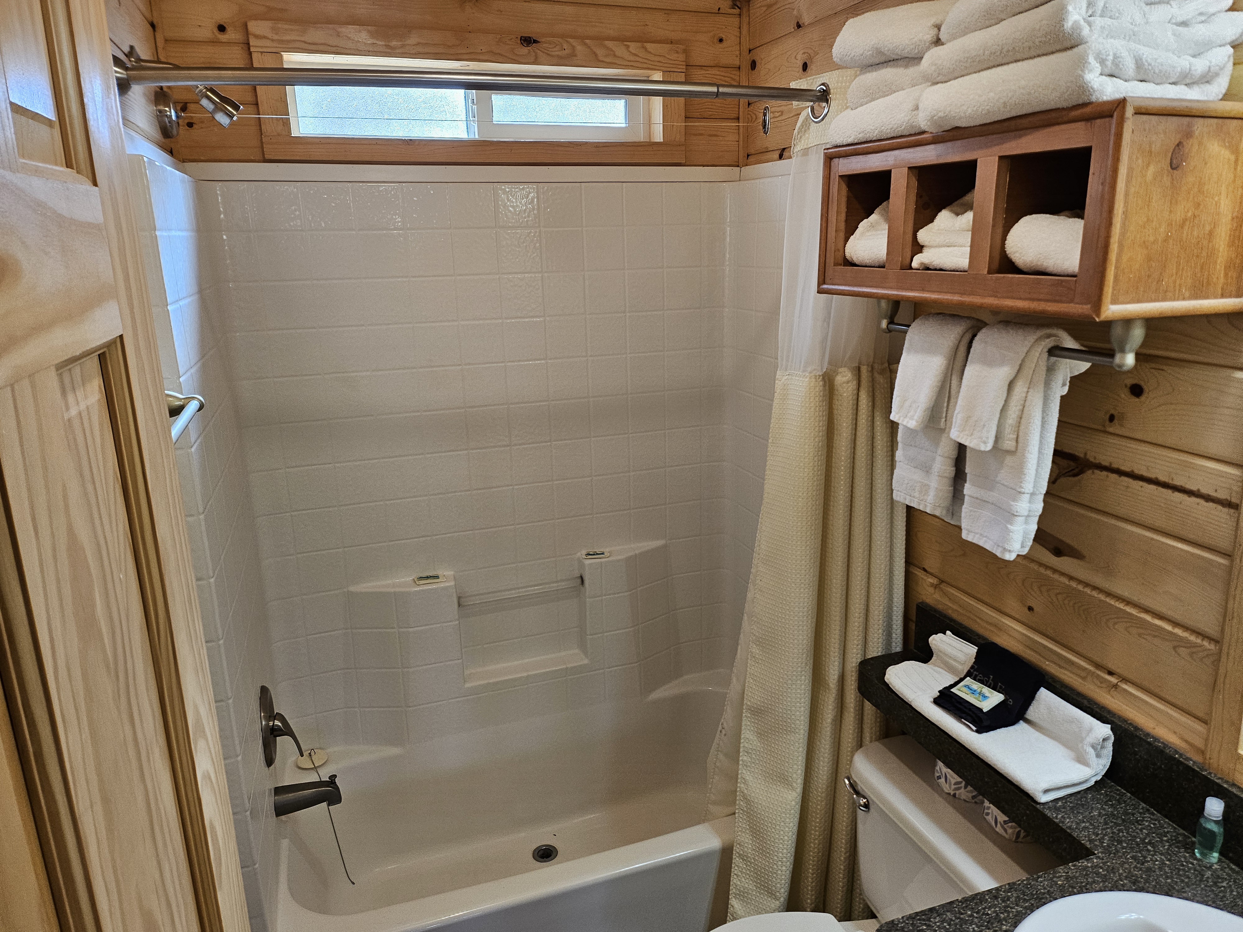 Tub and shower in the Deluxe Family Lodge