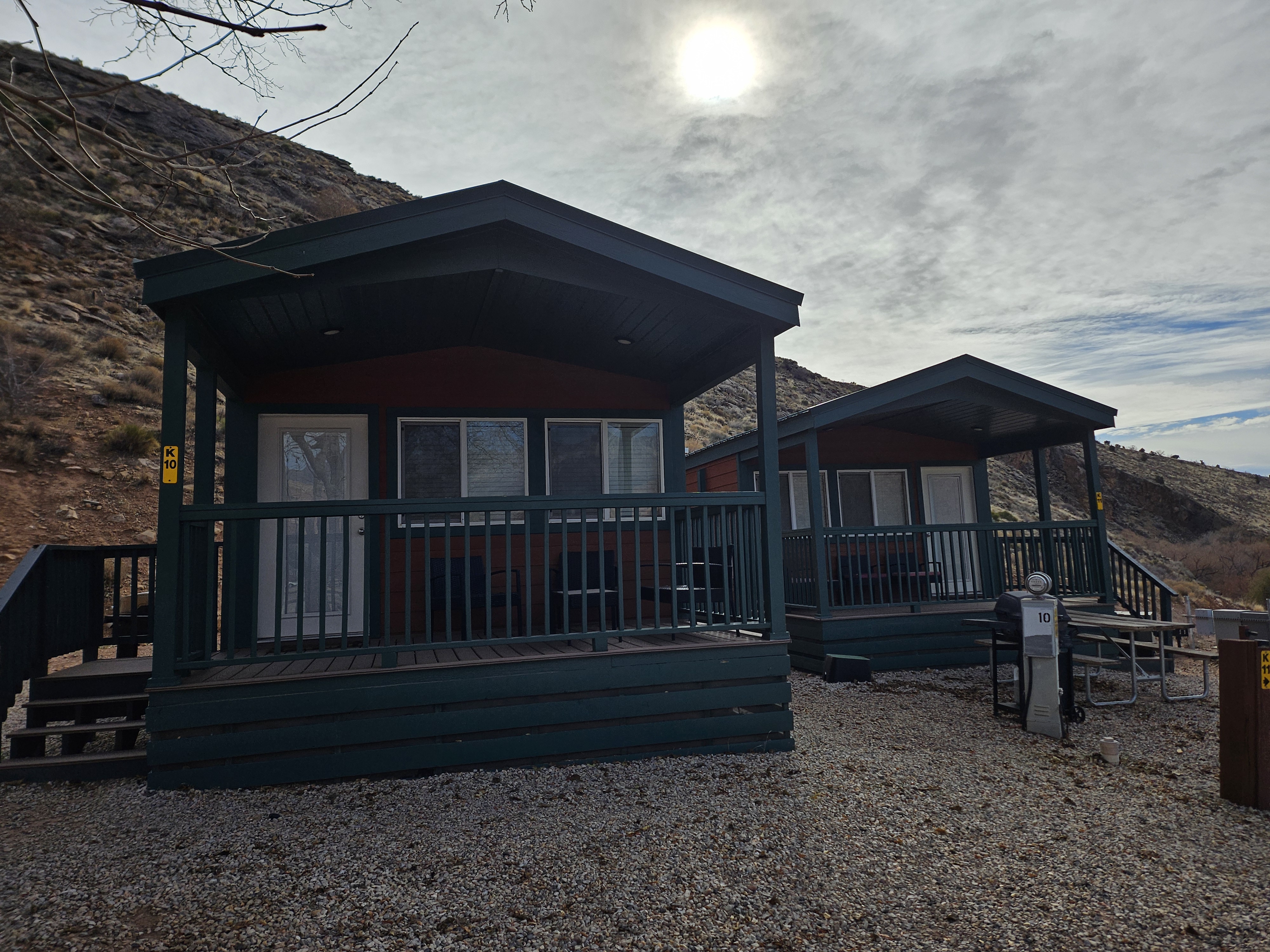 Deluxe Family Lodges nestled into the hillside have views of Red Cliffs Recreation Area