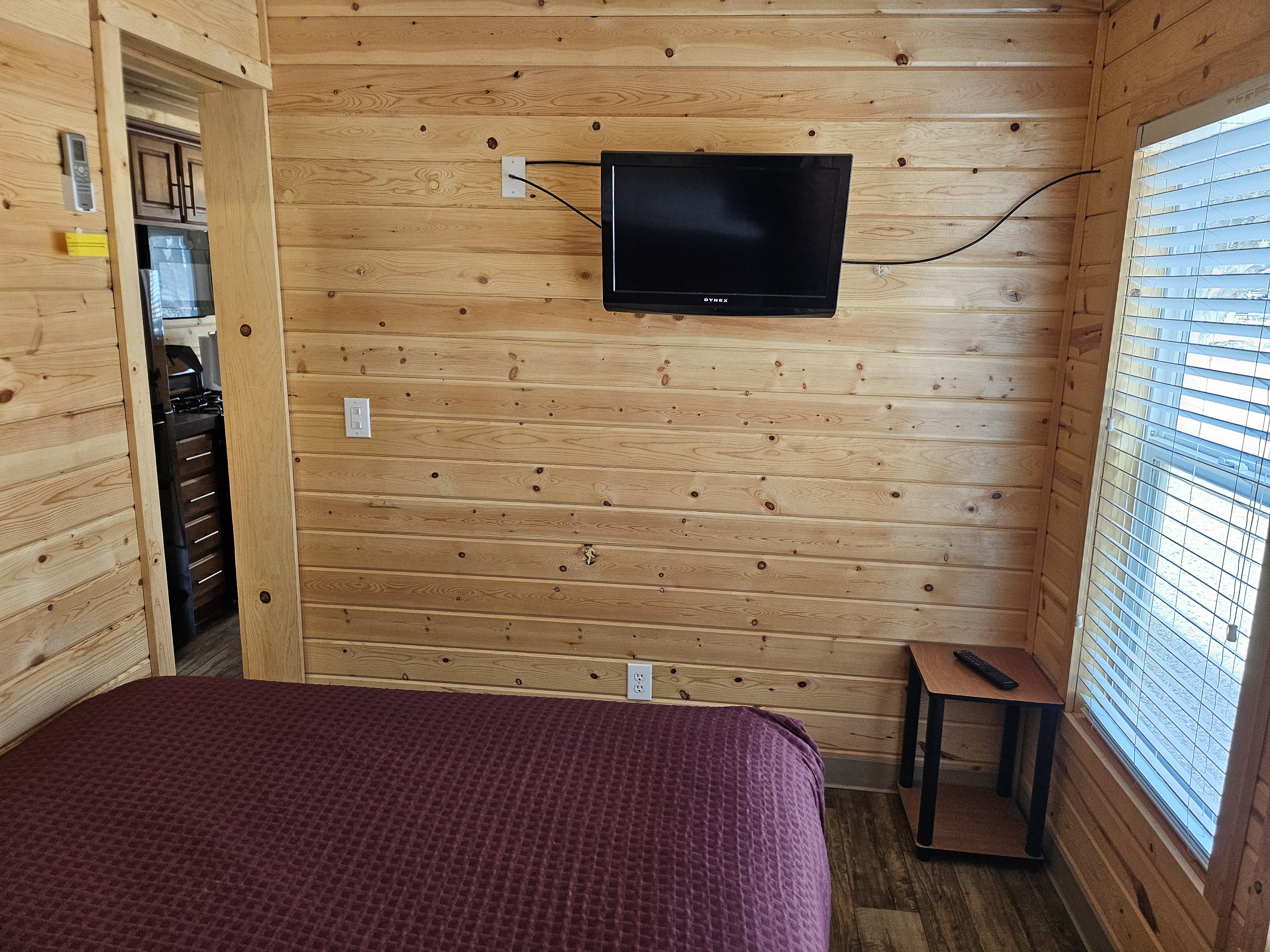 Each bedroom in the Deluxe Family Lodge has a TV