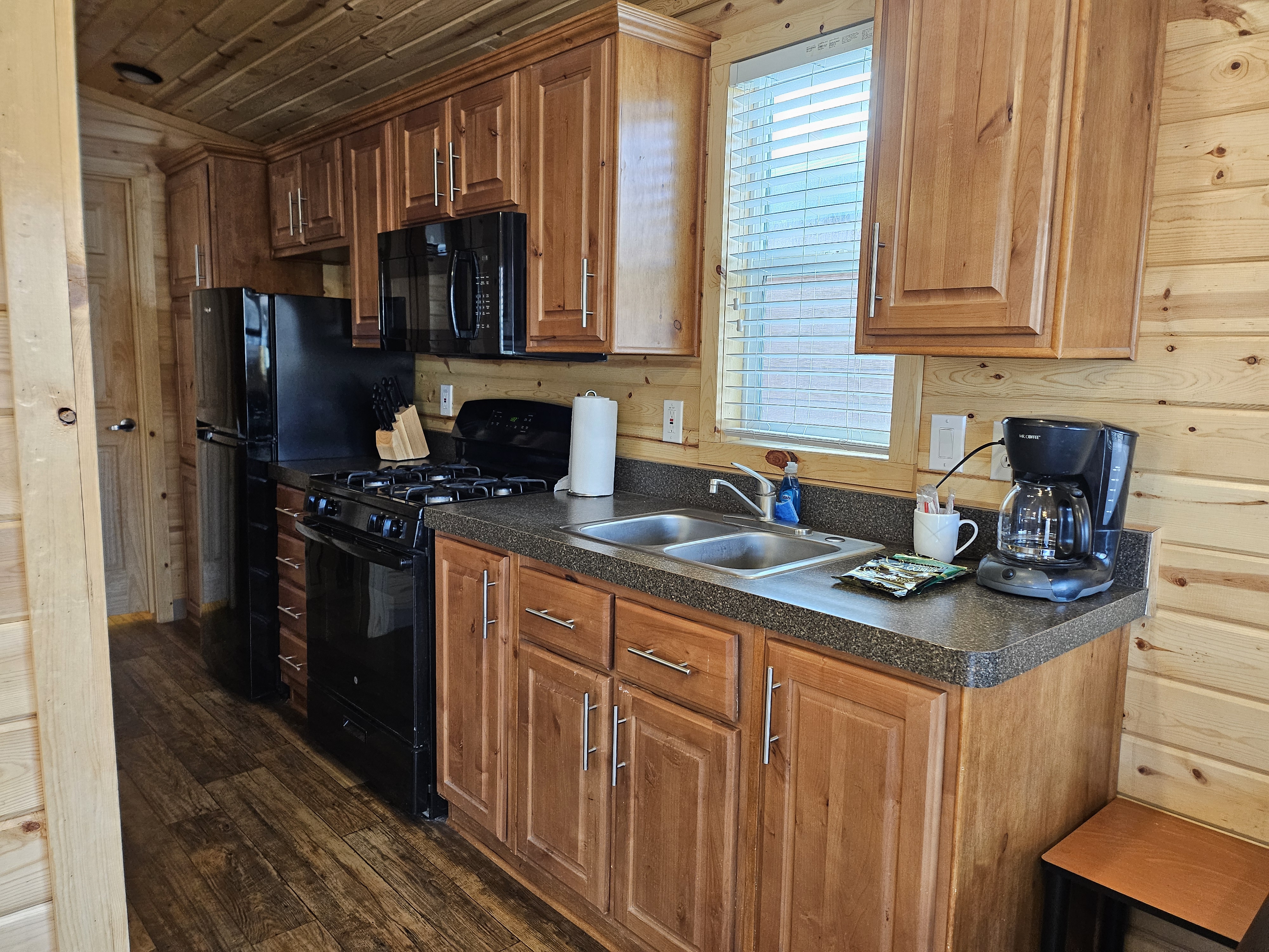 Deluxe Family Lodge Full Kitchen with appliances, cookware, and dishes for up to 6 people