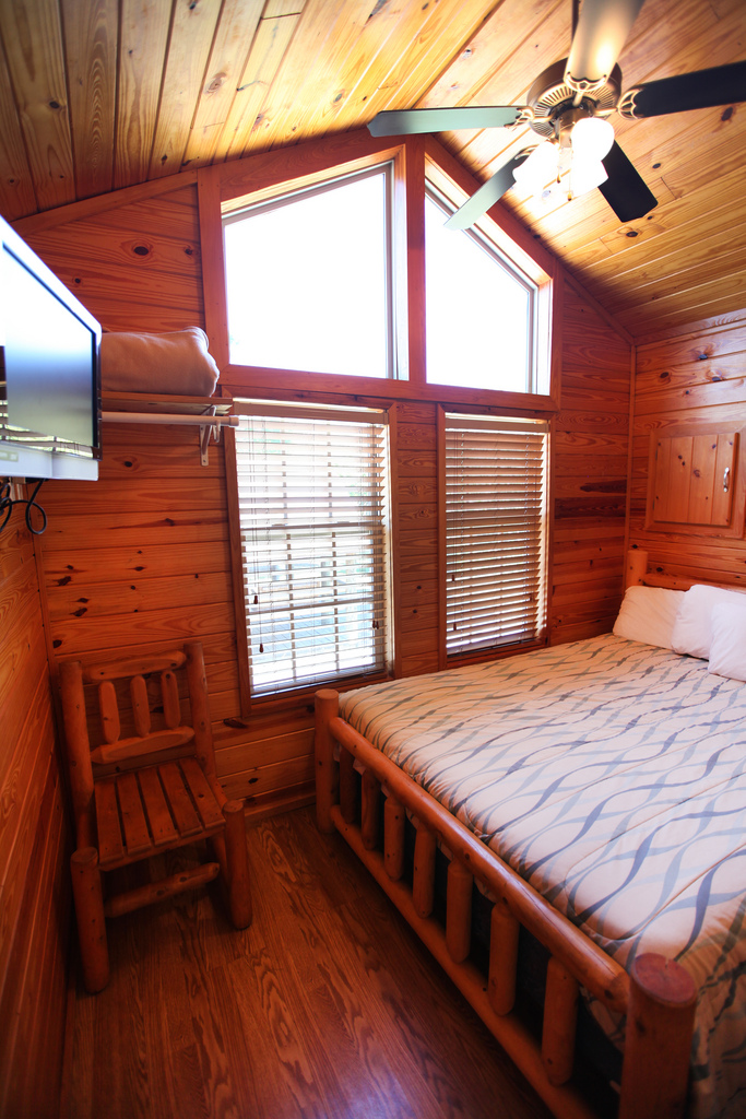 Queen bedroom complete with a television.