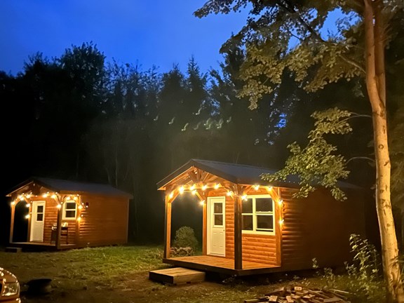 Wilderness cabins at night.