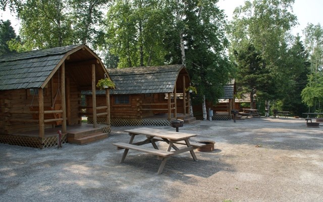 One Room Camping Cabin overlooking playground