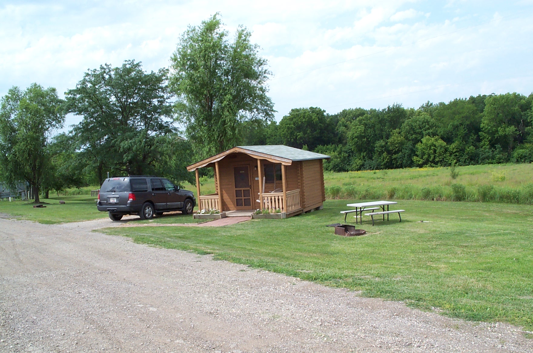Standard Cabin with Porch Swing, Picnic Table, and Fire Ring