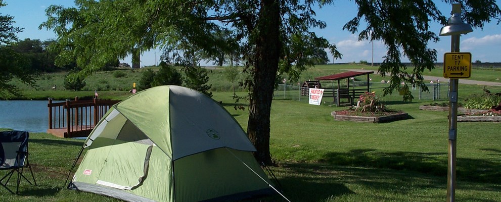tent site with electric next to pond