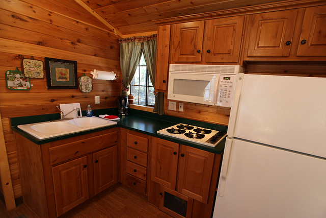 Kitchen complete w/dishes, silverware and cookware