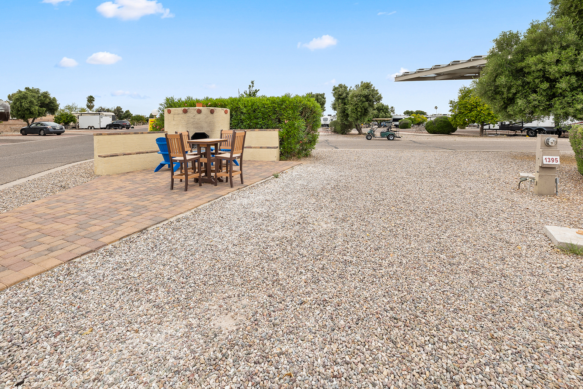RV 1395, Pull-Thru 50/30 AMPS FHU KOA Patio® with Fire Feature