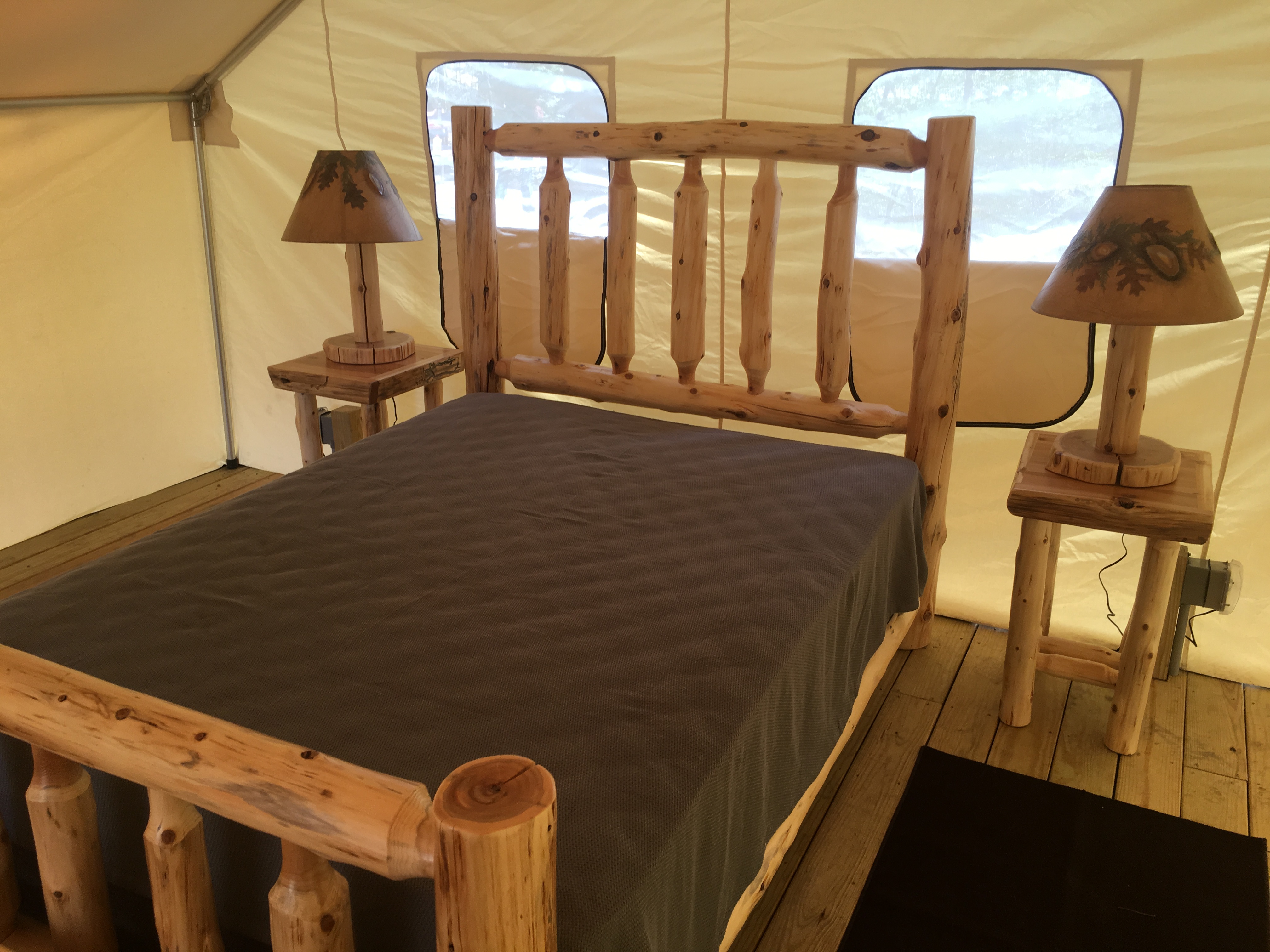Bed in glamping tent