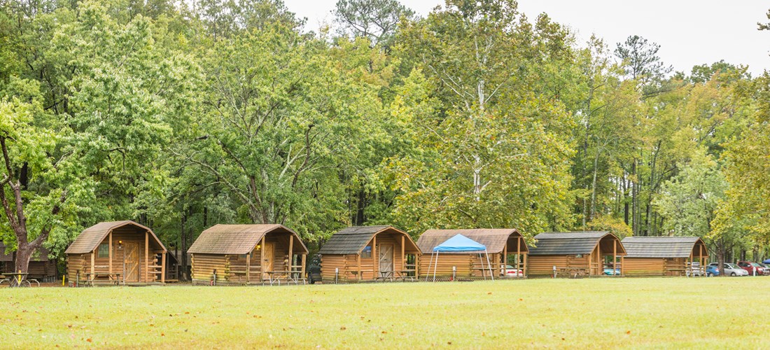 Camping Cabins in spacious grassy field