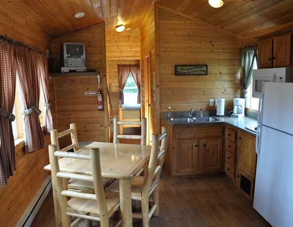 Our lodges are ready for you! Complete with pans, dishes, silverware, coffee pot. You bring your bedding and towels!