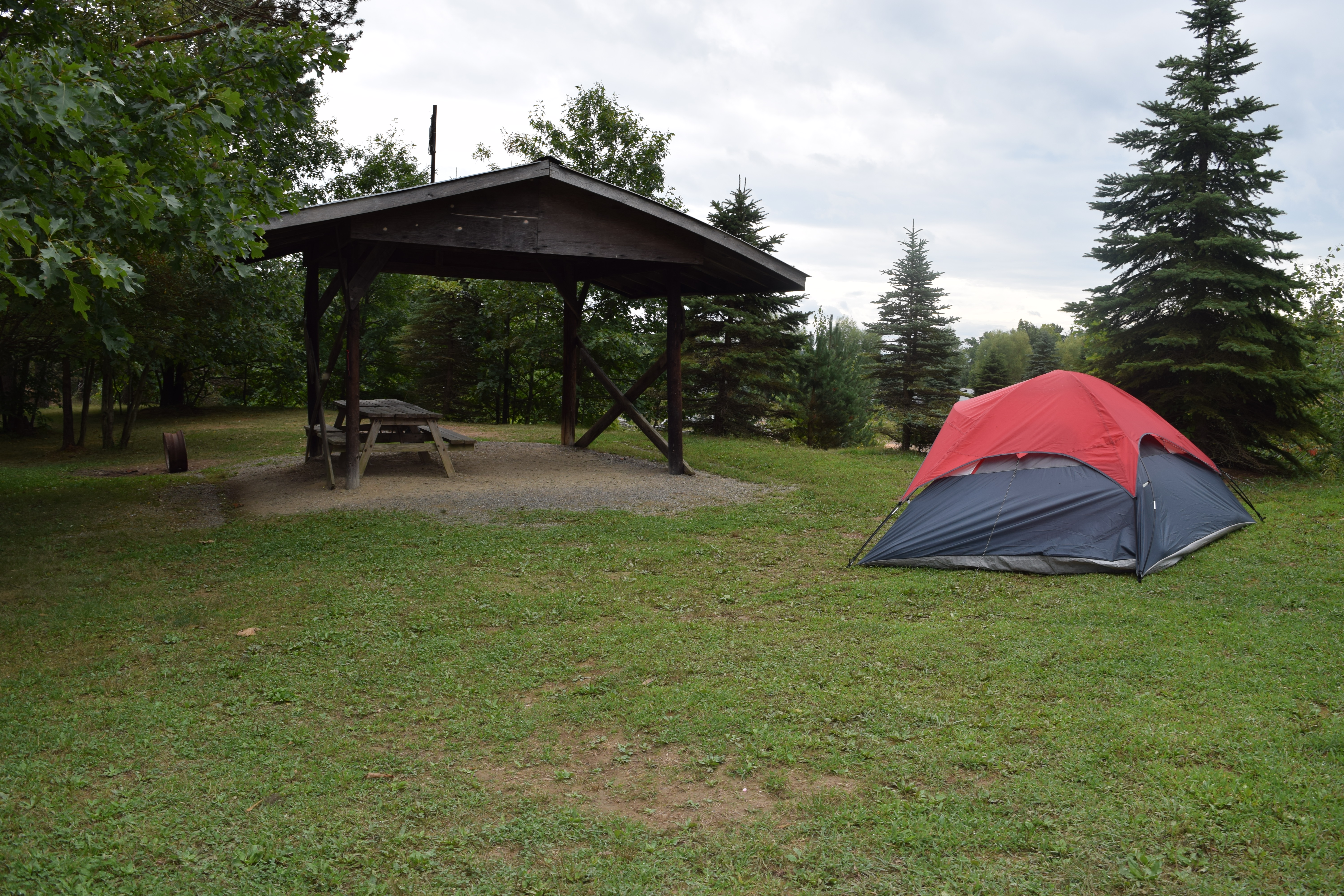 Back to nature. Enjoy these wooded sites in a secluded area of the park, but not far from facilities. Picnic tables & fire rings are located at the site for your convenience. Water is available.
