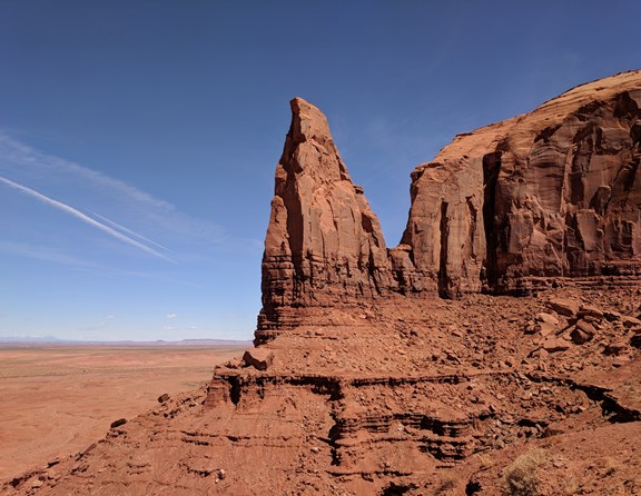 Straddling the Utah-Arizona border is the remarkable Monument Valley Navajo Tribal Park. You may have seen the unique mitten-shaped butte formations on a Western movie but there is nothing quite as amazing as seeing the formations up close looming in front of you! This region is comprised of a rich, red sandy landscape dotted with rock formations protruding up from the ground, carved by years of erosion into unique shapes and groupings. The area is a great place to visit and experience fantastic photo opportunities and stunning scenery. With so much to see and do in the area, many visitors look for camping opportunities nearby and the Monument Valley KOA campground is just a few short miles from the entrance to the park. Tent and RV campers will find a great base to set up for an overnight visit or a longer stay while venturing into the surrounding areas of Utah and Arizona.